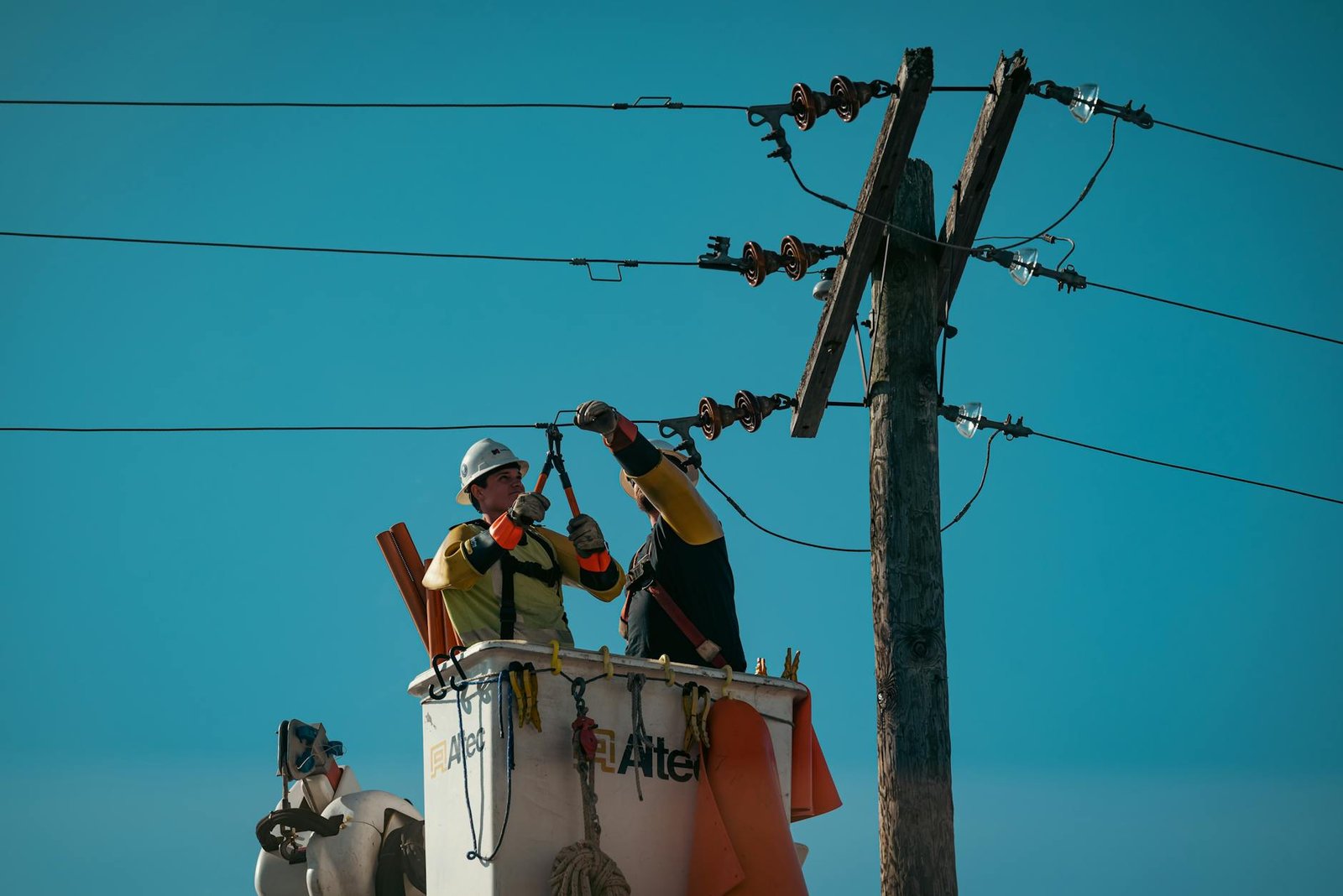 electricians fixing the electric lines